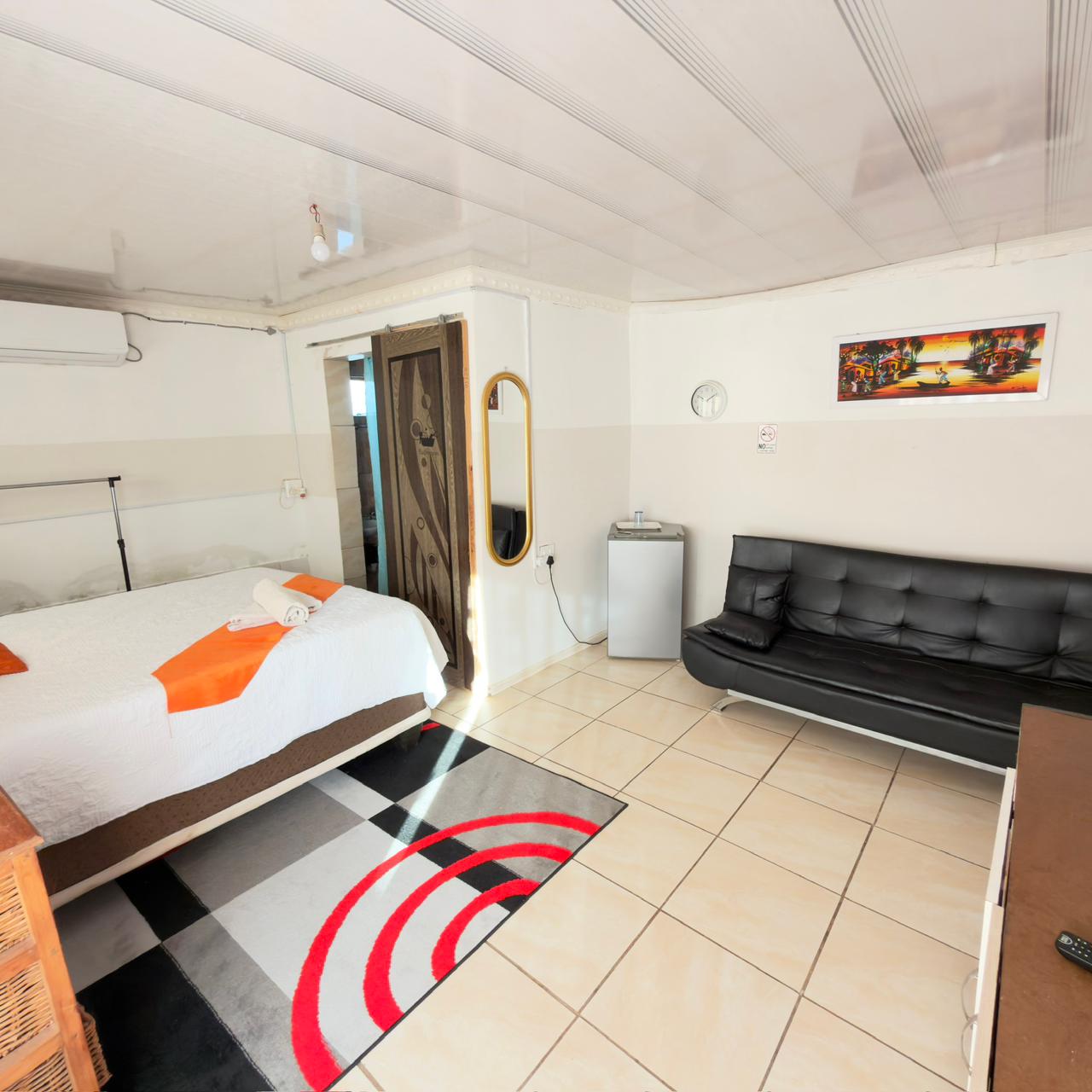 Comfortable guest room at Godmill City Guesthouse in Taung